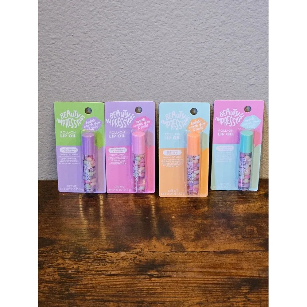 NWT Beauty Impressions Roll-On Lip Oil Bundle
